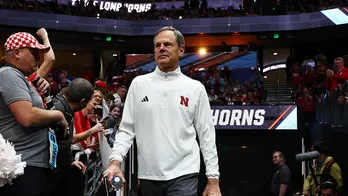 Nebraska volleyball coach John Cook's contract extension includes unique, horse-driven incentive