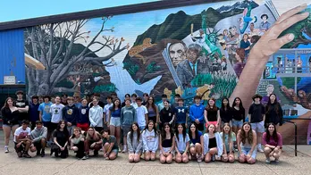 23 sets of twins graduate from one Massachusetts middle school: 'Extraordinarily high number'