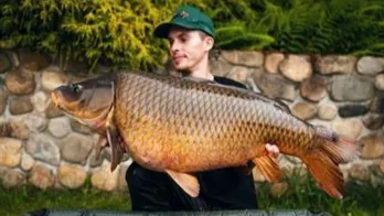 Angler reels in 45-pound carp, breaking record