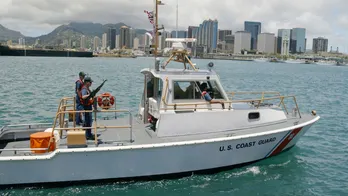 Coast Guard rushes to aid people in 'distressed' boat that was 'rapidly sinking'