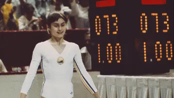 On this day in history, July 18, 1976, Nadia Comaneci scores perfect 10 at Summer Olympics