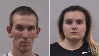 Iowa parents arrested after 4-year-old found outside home covered in filth allegedly escaped 'makeshift cage'