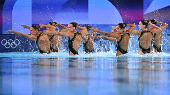 Team USA's Artistic Swimming Team Dropped An Upside Down, Underwater Moonwalk On An Unsuspecting Public