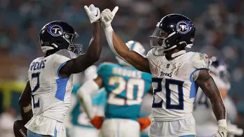 Titans pick up 1st win of season in ugly romp against Dolphins